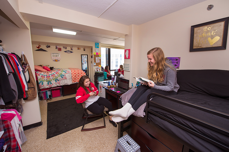 Quad room in Watterson Towers with bed on right junior lofted facing window.