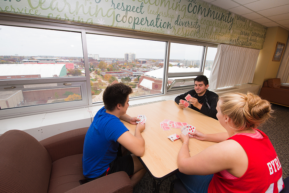 Top floor lounge in Wilkins Hall overlooking Redbird Athletic Complex and the Quad.